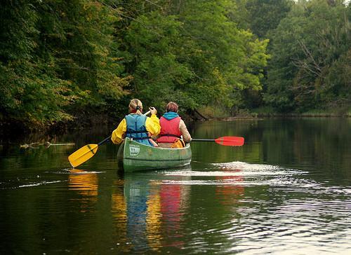 Enjoying the autumn colours of Soomaa on a canoeing trip!