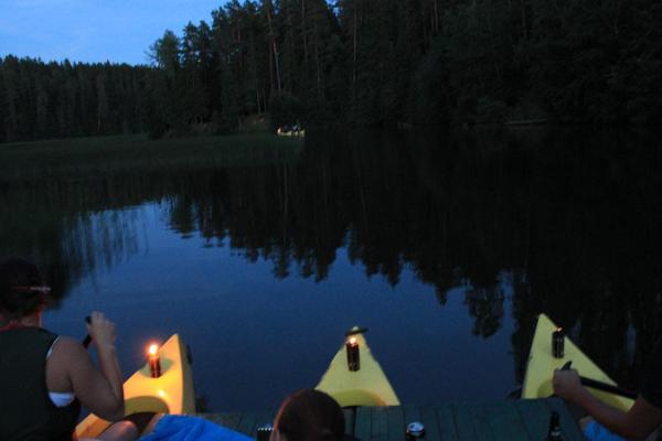 Romantic canoe raft trip with torches in Taevaskoda