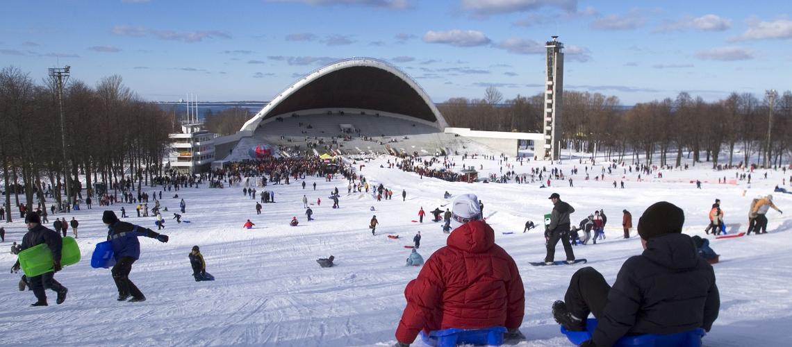 Children sledge down the hill of the Song Festival Grounds in Tallinn on Shrove Tuesday. 