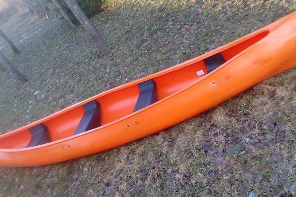 Family hike in a safe canoe on River Audru