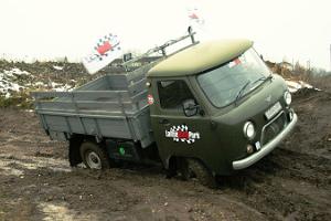 Driving an UAZ off-road vehicle on an obstacle course in LaitseRallyPark
