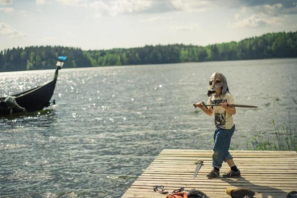 Two Teenage Boys Fishing by Lake Võrtsjärv in Estonia, Stock Photo