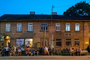 Barlova Bar and people enjoying the summer evening in front of it