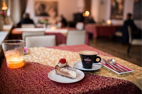 Werner Café, with a cake and a cup of coffee