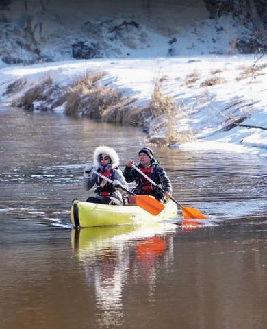 Winter canoe trip and crisp snowy shores