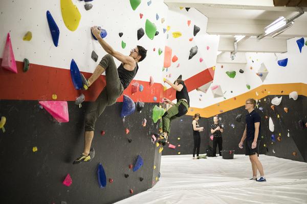 Enthusiasts on the climbing wall of Tartu Ministry of Climbing