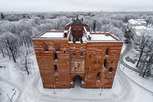 Spires of Tartu Cathedral in winter, University of Tartu Museum in snowy winter