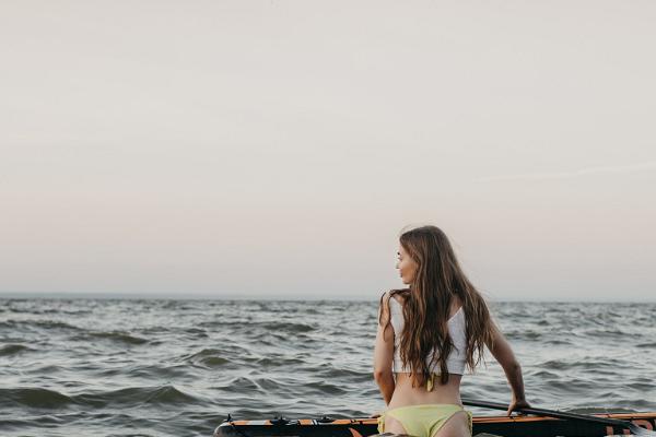 SUP boarding at sea