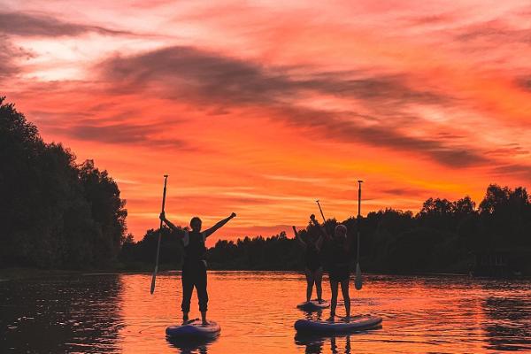 SUP board and sunset on the River Emajõgi