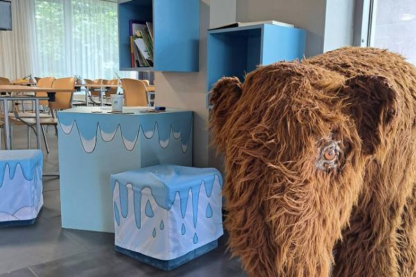 children's area, lump of ice and a small hairy mammoth