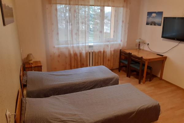 Jõesuu Home Accommodation - a room with two beds