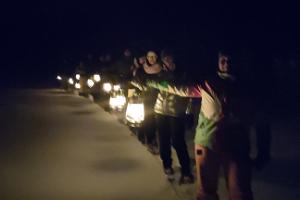 Lantern hike in pristine nature and campfire night